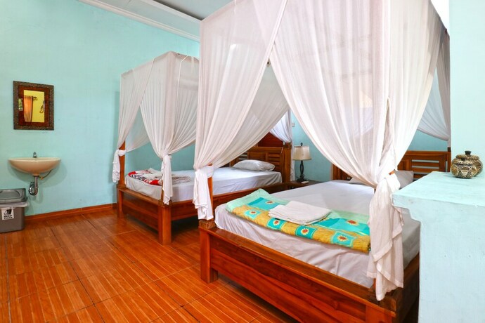 Imagen de la habitación del Hotel Nirmala Guest House Surf Keramas. Foto 12