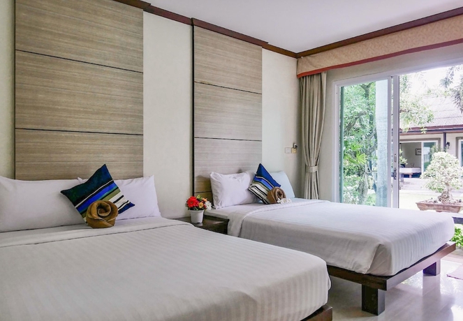 Imagen de la habitación del Hotel Nirundorn Resort. Foto 15