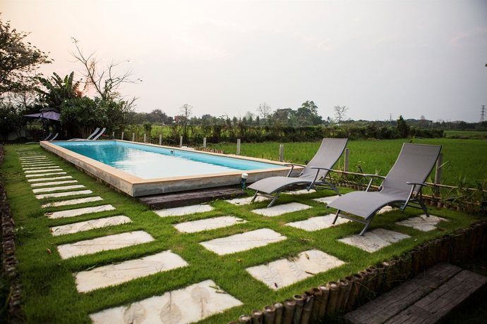 Imagen de la piscina del Hotel Nirvana Chiang Mai. Foto 6