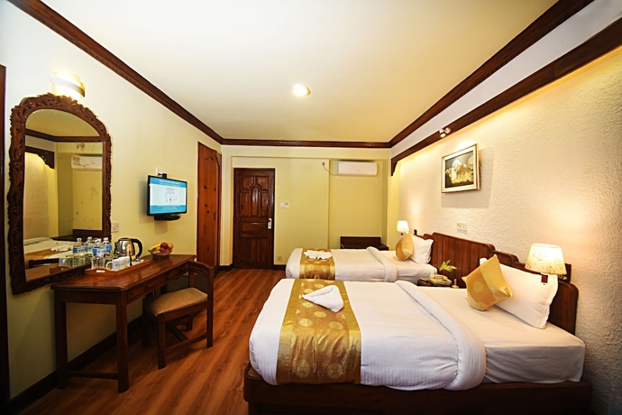 Imagen de la habitación del Hotel Nirvana Garden. Foto 8