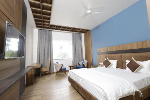 Imagen de la habitación del Hotel Nirvana Grand Hotel & Resort. Foto 18