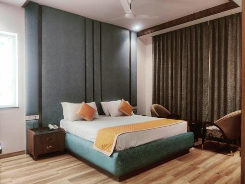 Imagen de la habitación del Hotel Nirvana Grand Hotel & Resort. Foto 20