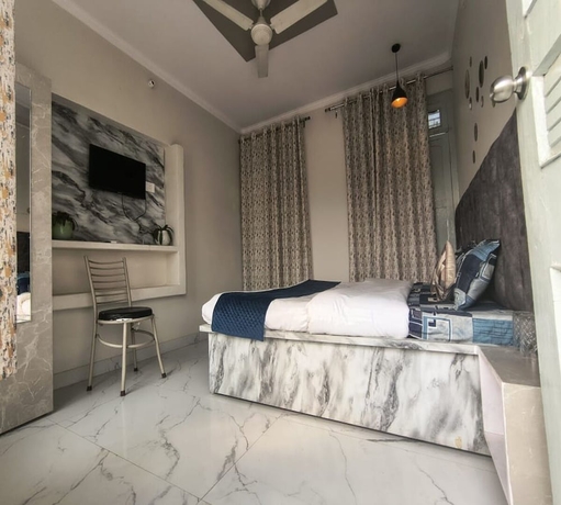 Imagen de la habitación del Hotel Nirvana Inn, Faizabad. Foto 5