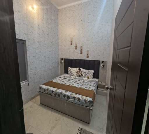 Imagen de la habitación del Hotel Nirvana Inn, Faizabad. Foto 11