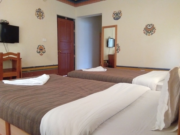 Imagen de la habitación del Hotel Nirvana Lodge. Foto 13