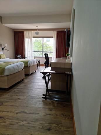 Imagen de la habitación del Hotel Nirvana Luxury International. Foto 14