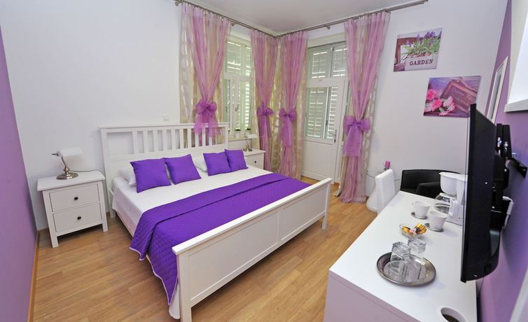 Imagen de la habitación del Hotel Nirvana Luxury Rooms. Foto 12