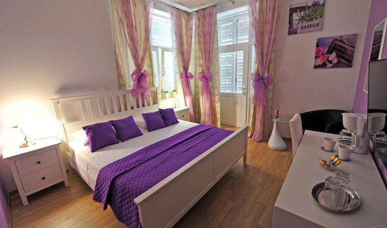 Imagen de la habitación del Hotel Nirvana Luxury Rooms. Foto 13