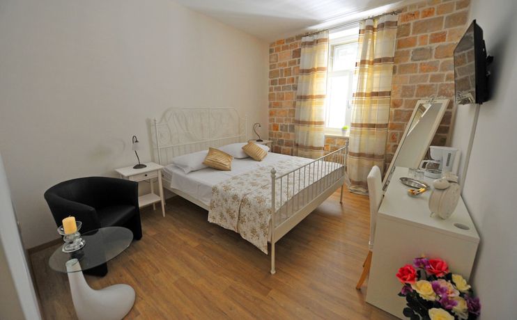 Imagen de la habitación del Hotel Nirvana Luxury Rooms. Foto 17