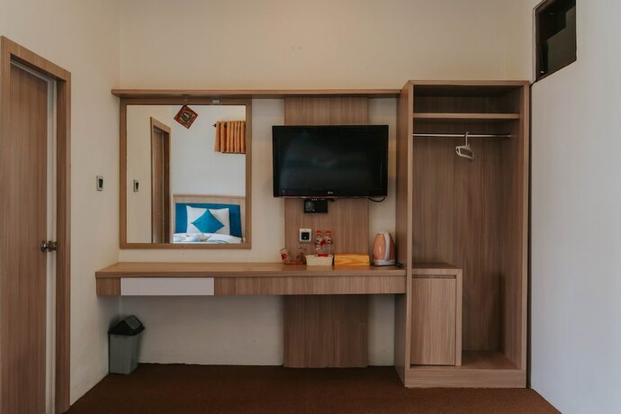 Imagen de la habitación del Hotel Nirvana Resort Tetebatu. Foto 13