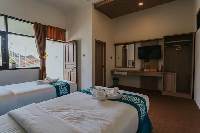 Imagen de la habitación del Hotel Nirvana Resort Tetebatu. Foto 19