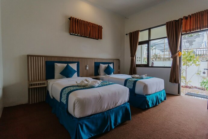 Imagen de la habitación del Hotel Nirvana Resort Tetebatu. Foto 20