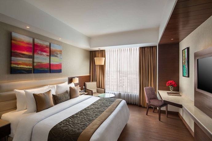 Imagen de la habitación del Hotel Nirvana Sarovar Portico Gorakhpur. Foto 11