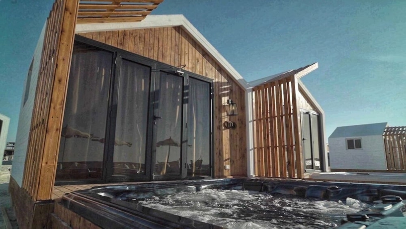Imagen de la habitación del Hotel Nirvana Wellness Huts - White bay. Foto 17