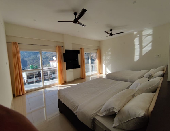 Imagen de la habitación del Hotel Nirvanam. Foto 14