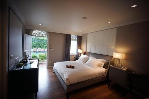 Imagen de la habitación del Hotel Nirvanan House. Foto 8