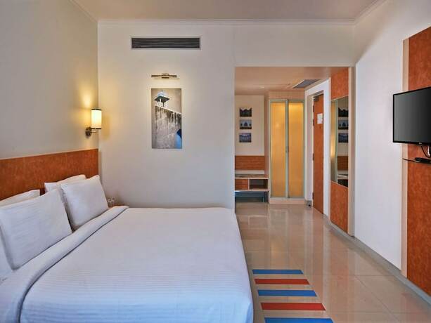 Imagen de la habitación del Hotel Nirwana Hometel Jaipur. Foto 19