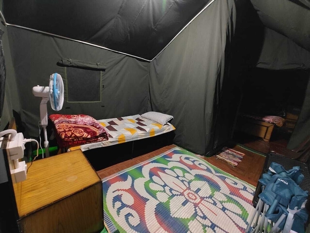 Imagen de la habitación del Hotel Nisarg Camping Pods. Foto 15