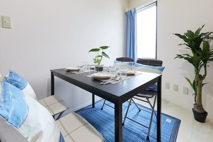 Imagen de la habitación del Hotel Nishikamata Colorbee House. Foto 18