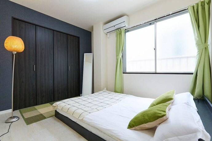 Imagen de la habitación del Hotel Nishikamata Colorbee House. Foto 19