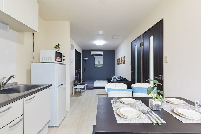 Imagen de la habitación del Hotel Nishikamata Colorbee House. Foto 22