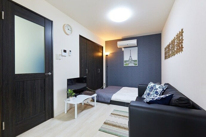 Imagen de la habitación del Hotel Nishikamata Colorbee House. Foto 23