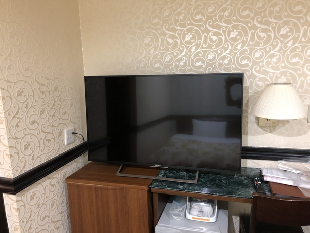 Imagen de la habitación del Hotel Nishikawaguchi Station Stay Lounge. Foto 3