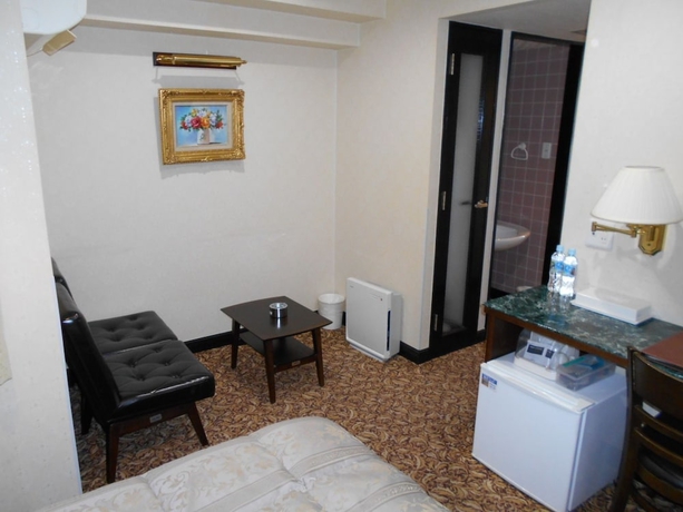 Imagen de la habitación del Hotel Nishikawaguchi Station Stay Lounge. Foto 5