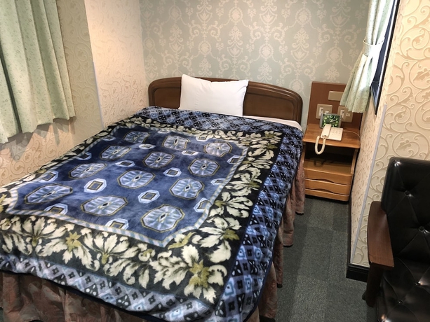 Imagen de la habitación del Hotel Nishikawaguchi Station Stay Lounge. Foto 8
