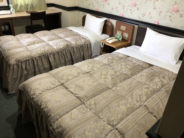 Imagen de la habitación del Hotel Nishikawaguchi Station Stay Lounge. Foto 10
