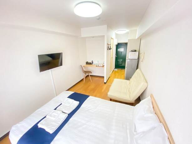Imagen de la habitación del Hotel Nishikawaguchi Weekly. Foto 18