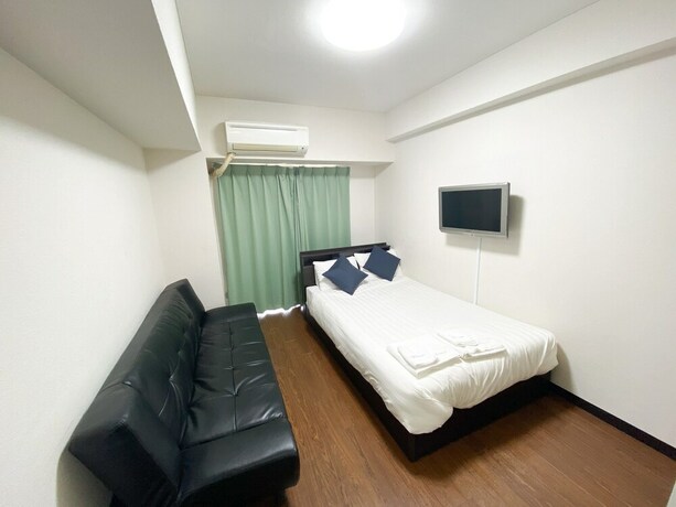 Imagen de la habitación del Hotel Nishikawaguchi Weekly. Foto 24