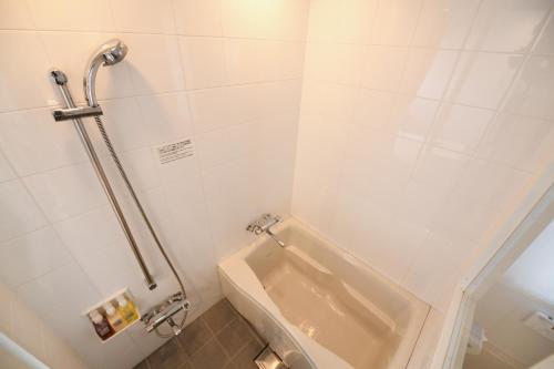 Imagen de la habitación del Hotel Nishitetsu Inn Kamata. Foto 9