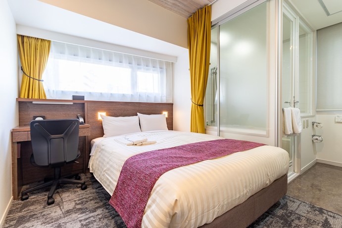 Imagen de la habitación del Hotel Nishitetsu Inn Kamata. Foto 13