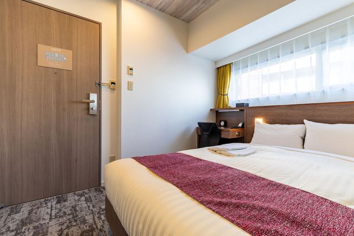 Imagen de la habitación del Hotel Nishitetsu Inn Kamata. Foto 14