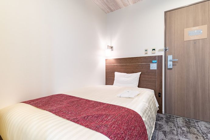 Imagen de la habitación del Hotel Nishitetsu Inn Kamata. Foto 15