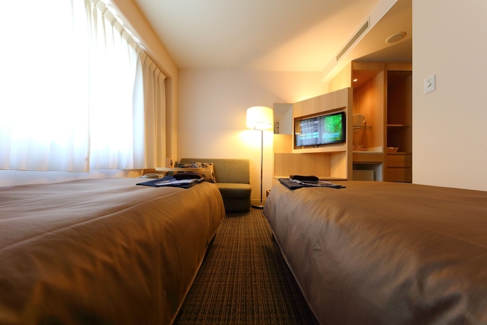 Imagen de la habitación del Hotel Nishitetsu Resort Inn Beppu. Foto 5