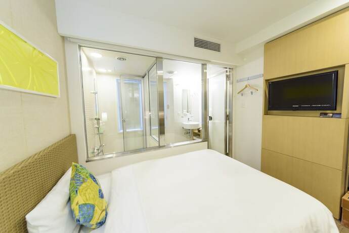 Imagen de la habitación del Hotel Nishitetsu Resort Inn Naha. Foto 12