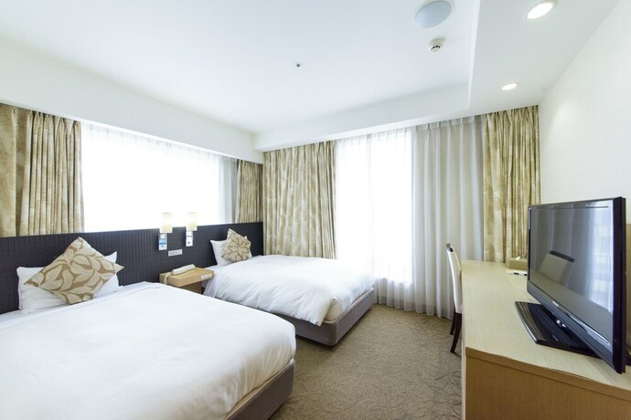 Imagen de la habitación del Hotel Nishitetsu Resort Inn Naha. Foto 13