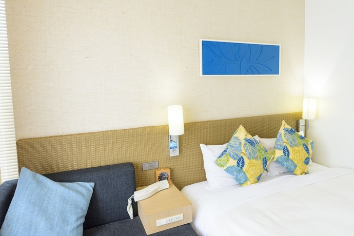 Imagen de la habitación del Hotel Nishitetsu Resort Inn Naha. Foto 14