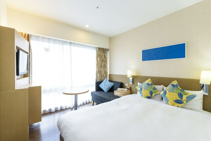 Imagen de la habitación del Hotel Nishitetsu Resort Inn Naha. Foto 17