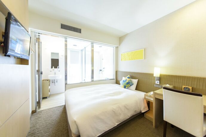 Imagen de la habitación del Hotel Nishitetsu Resort Inn Naha. Foto 18