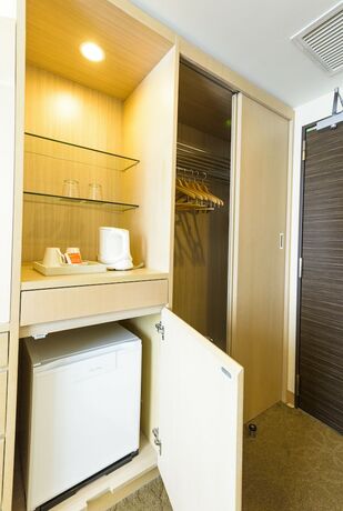 Imagen de la habitación del Hotel Nishitetsu Resort Inn Naha. Foto 19