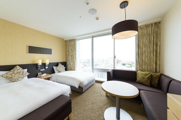 Imagen de la habitación del Hotel Nishitetsu Resort Inn Naha. Foto 21