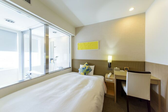 Imagen de la habitación del Hotel Nishitetsu Resort Inn Naha. Foto 23