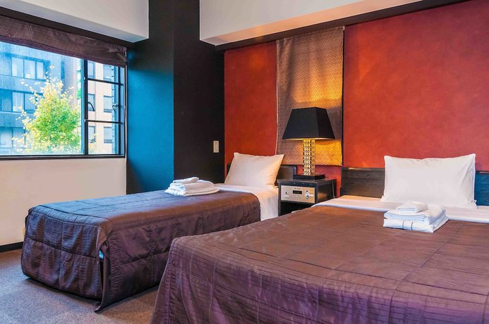 Imagen de la habitación del Hotel Nissei Fukuoka. Foto 7