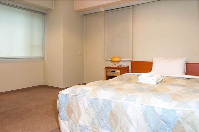 Imagen de la habitación del Hotel Nissei Fukuoka. Foto 14