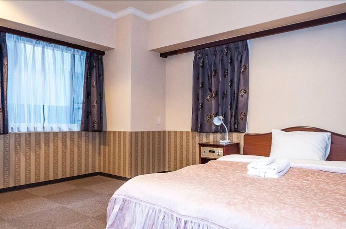 Imagen de la habitación del Hotel Nissei Fukuoka. Foto 17