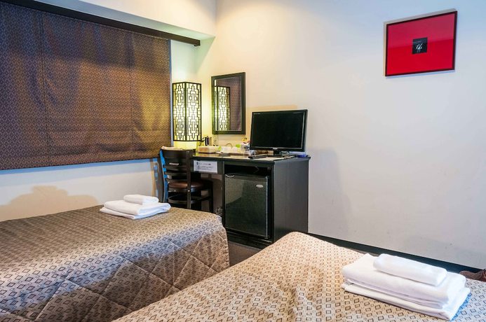 Imagen de la habitación del Hotel Nissei Fukuoka. Foto 18