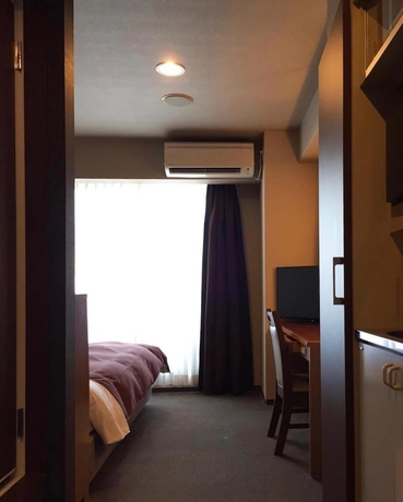 Imagen de la habitación del Hotel Nissin Namba Inn. Foto 7